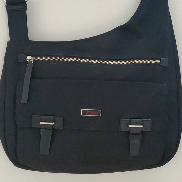 Tumi Pucket E/W Flap Crossbody Messenger Bag in Black/Silver/Leather… - Picture 1 of 13